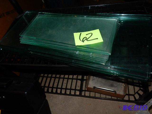 Shelf Glass.. 4 pieces, 14 in thick x 28 12...