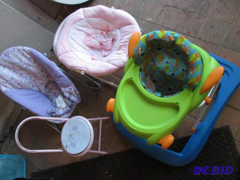 Lot of bouncy chairs and a walker...