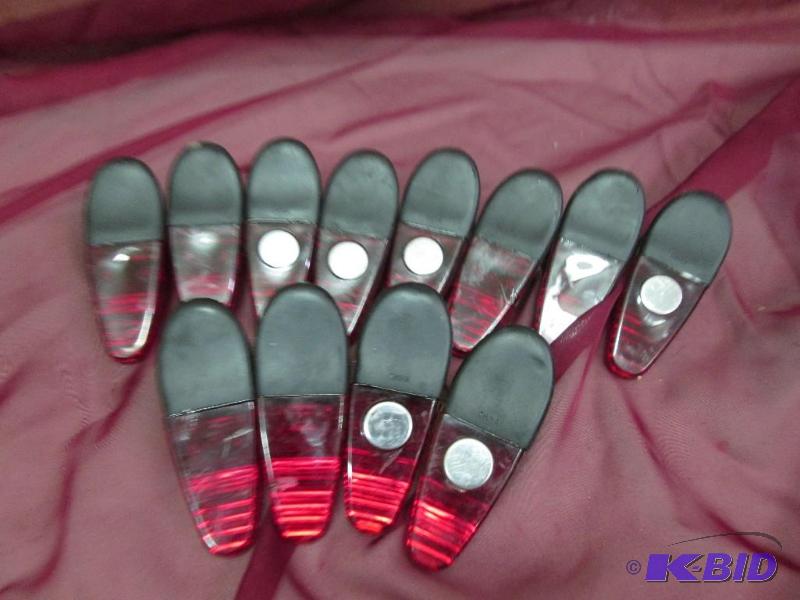 Lot of plastic clips with magnetic back, rubb...