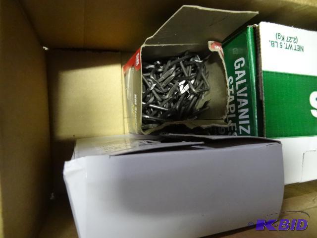 New box lot of staples and nails. Contains 5 ...