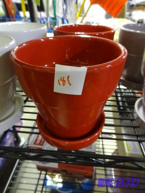 New lot of 2 ceramic planters. 6 inch with re...