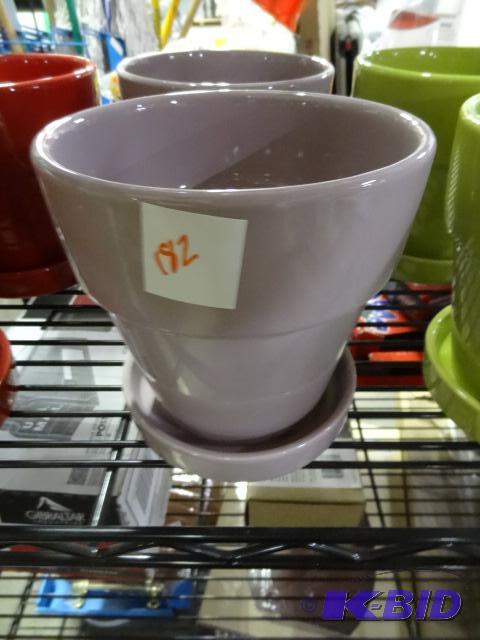New lot of 2 ceramic planters. 6 inch with la...