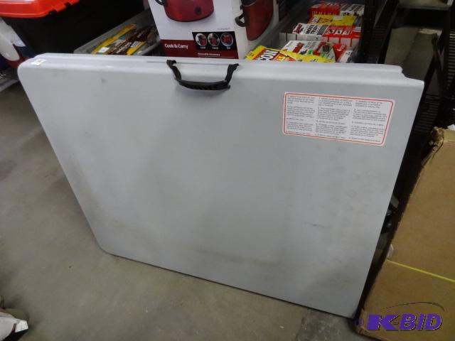 New 6 foot folding half thermoplastic table. ...