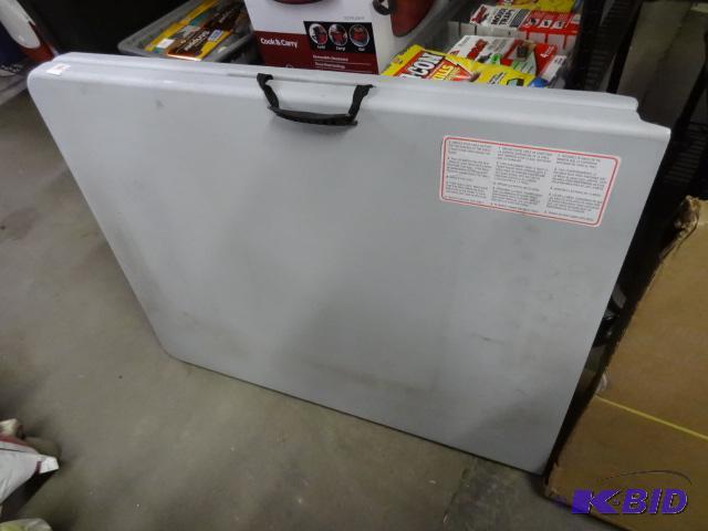 New 6 foot folding half thermoplastic table. ...