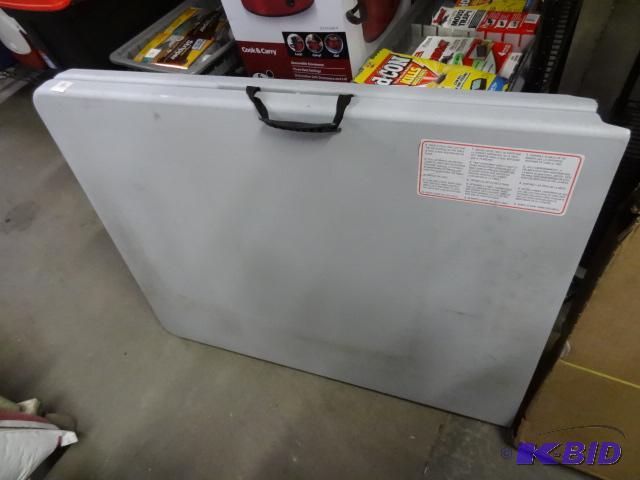 New 6 foot folding half thermoplastic table. ...