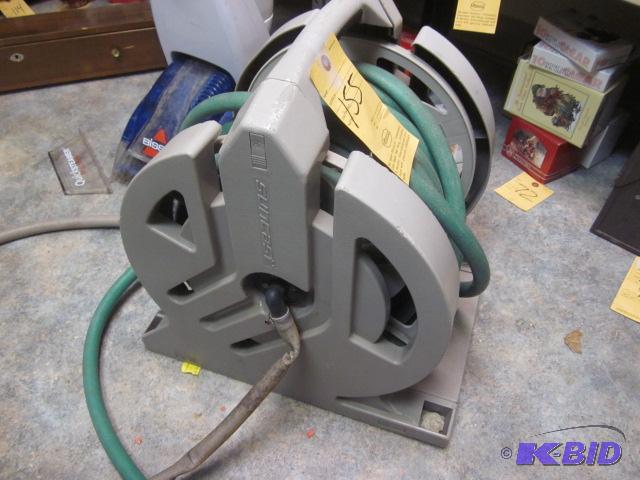 Hose reel with hose.&nbsp  &nbsp  &nbsp...