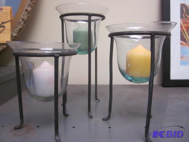 Rod iron and glass graduated candle holders.&...