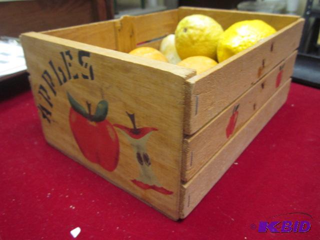 Wooden box with painted alabaster fruit insid...