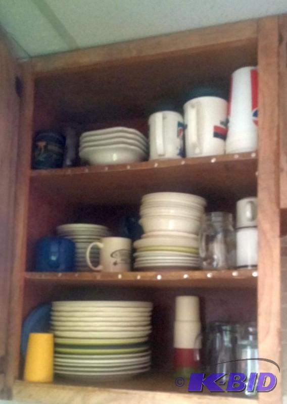 All contents of cupboard, plates, glasses bow...