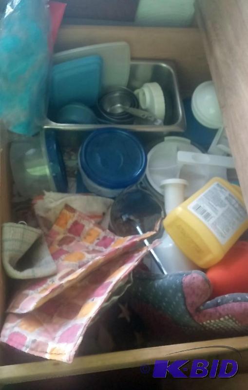 Drawer full of kitchen utensils, as shown in ...