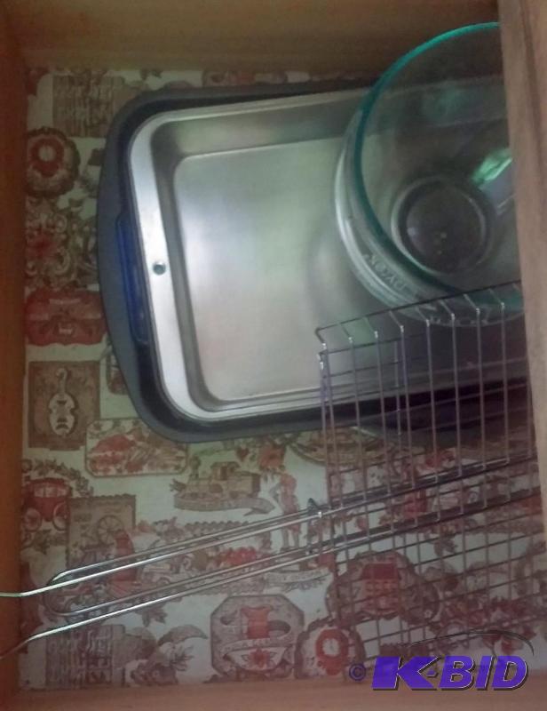Drawer full of kitchen utensils, as shown in ...