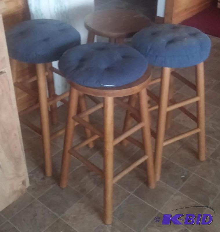 4 Heavy bar stools with pads...