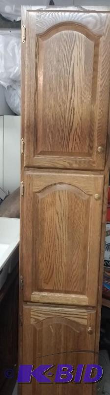 Tall cabinet with shelving. Measures 24&quot...