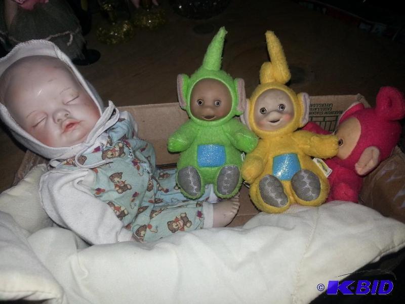 Vintage Porcelain Doll with stuffed Teletubbi...