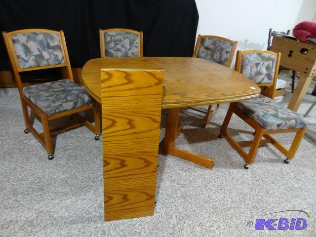 lot 22 image: Kitchen Table and 4 Chairs, comes with 1 Leaf...
