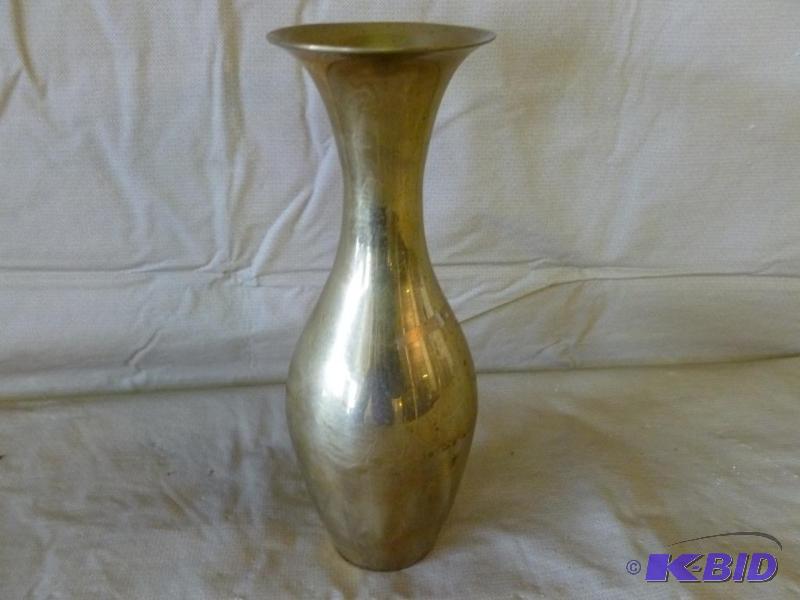 lot 106 image: Vintage cast brass vase that measures 2.5&quo...