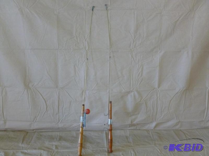 lot 109 image: Lot of two large wood handled ice fishing jig...
