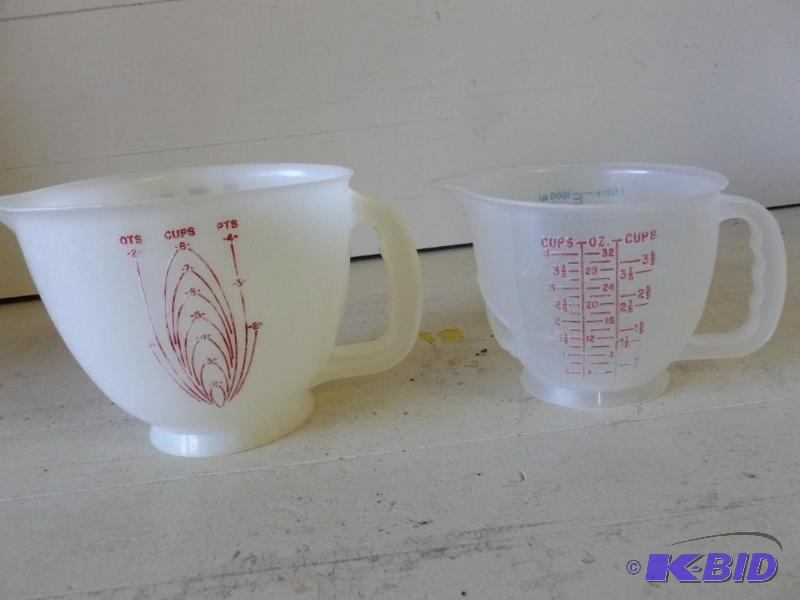 lot 155 image: Lot of two large Tupperware plastic measuring...