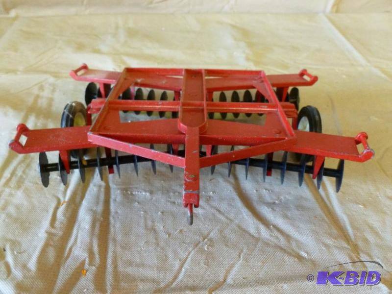 lot 16 image: Large Ertl Die Cast Metal Field Disc that mea...