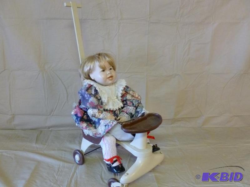 lot 34 image: Vintage metal doll stroller with doll, great ...