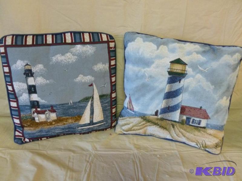 lot 40 image: Lot of two lighthouse themed throw pillows....