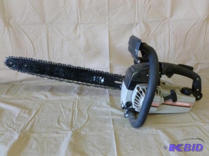 lot 53 image: Craftsman 18" gas powered chain saw mode...