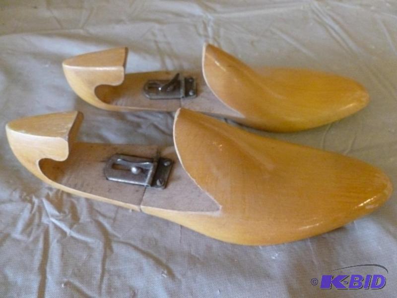 lot 94 image: A pair of vintage wooden shoe savers that mea...