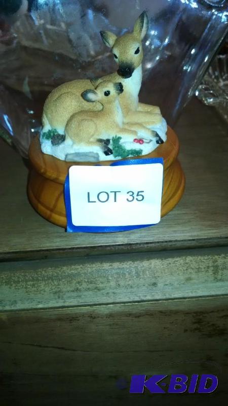 Music box deer with wood base. 3 12&quotwx...