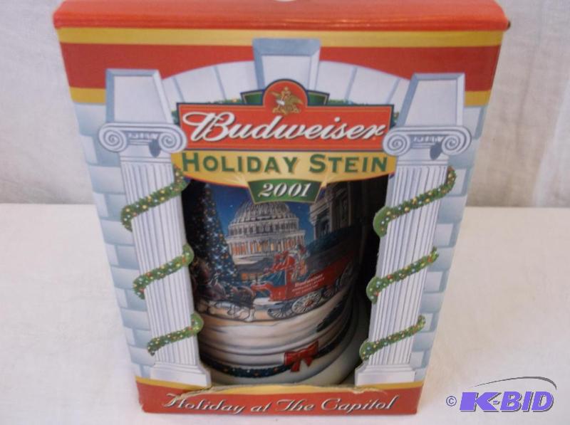 lot 12 image: Embossed 2001 Budweiser holiday beer stein li...