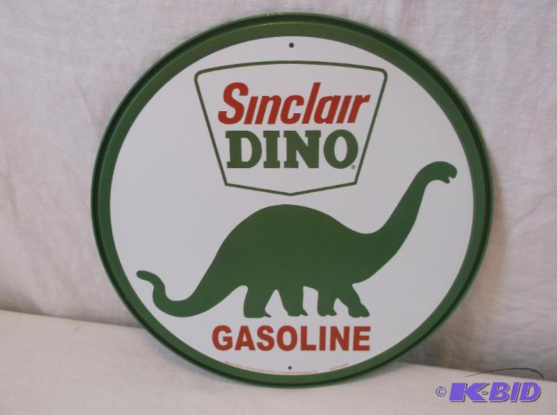 lot 14 image: Sinclair Gasoline sign 11 34" dia. in g...