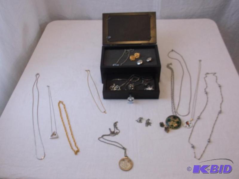 lot 19 image: Jewelry box loaded with bracelet,necklaces,ea...