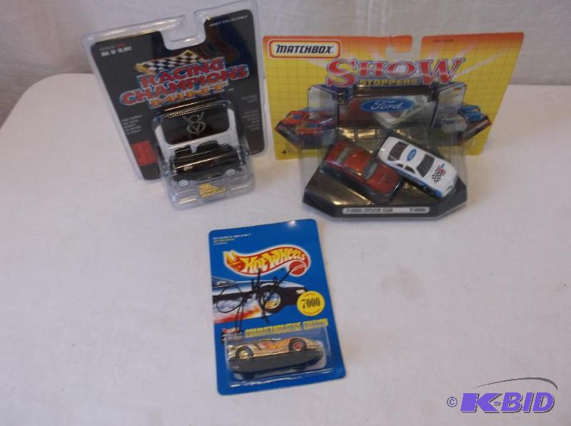 lot 26 image: Lot with Adult collectable racing champions m...