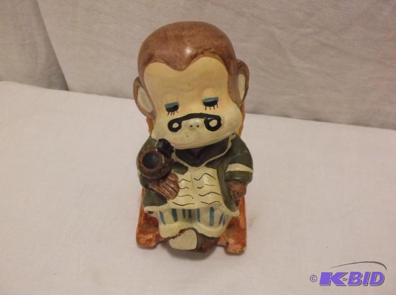 lot 39 image: Cute monkey bank in great condition....