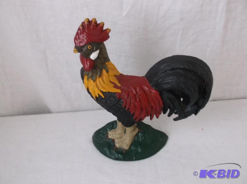 lot 6 image: Heavy cast iron rooster door stop in great co...