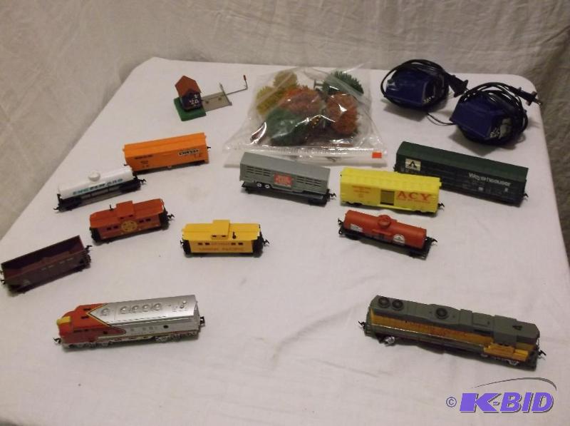 lot 74 image: Train set with 2 engines,boxcars,track,trees...