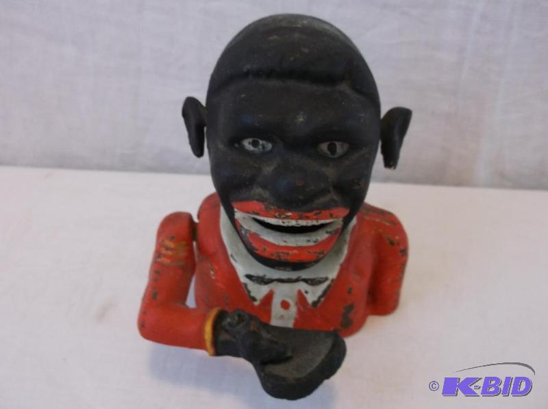 lot 8 image: Vintage cast iron mechanical bank nice piece....