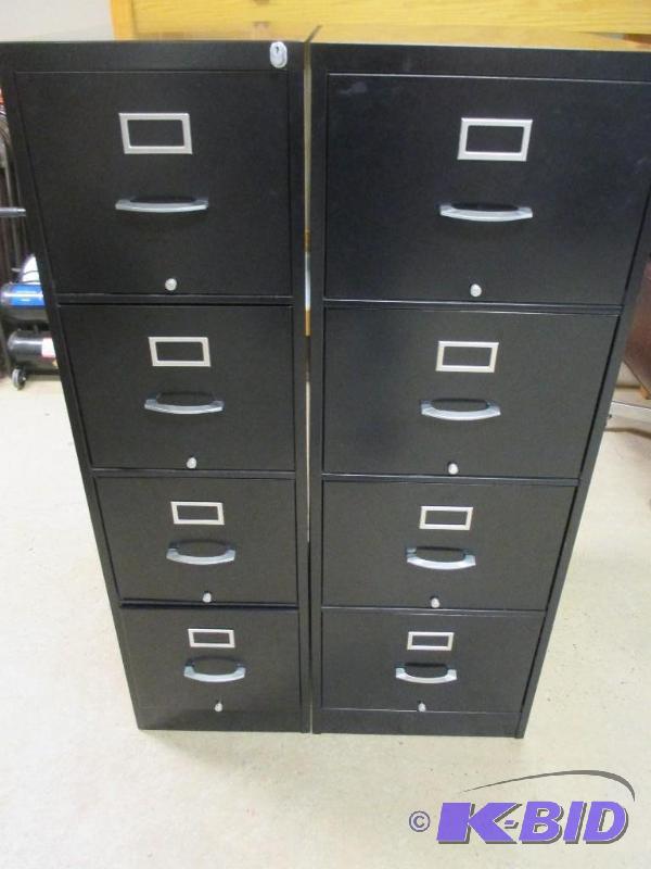Two Tall Black Filing Cabinets