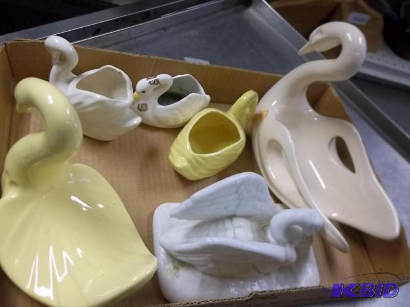 lot of ceramic swan figurenes