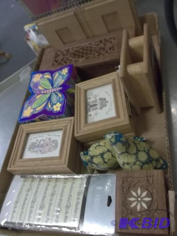 box of trinkit boxes and art supplies