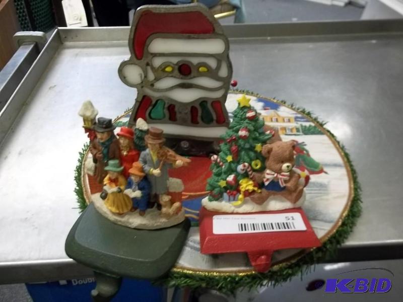 box of christmas items stocking hanger tea light santa wall picture