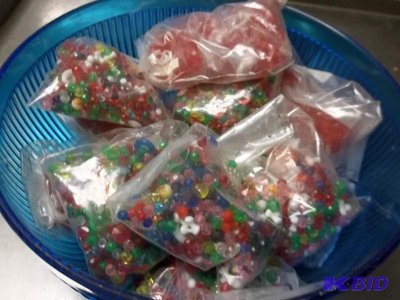 blue bowl full of large lot of craft beads