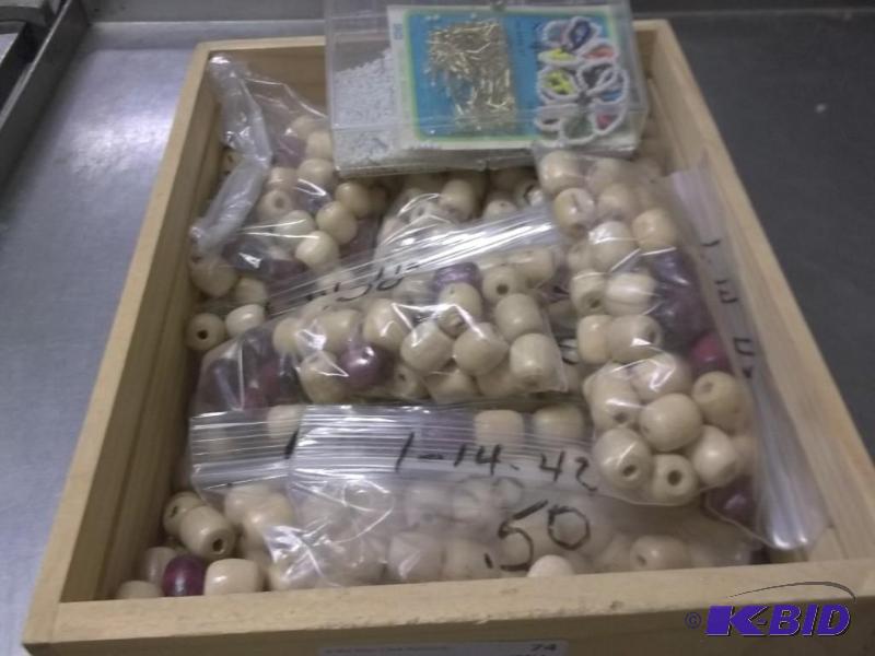 lot of wood beads and sequin pins and beads