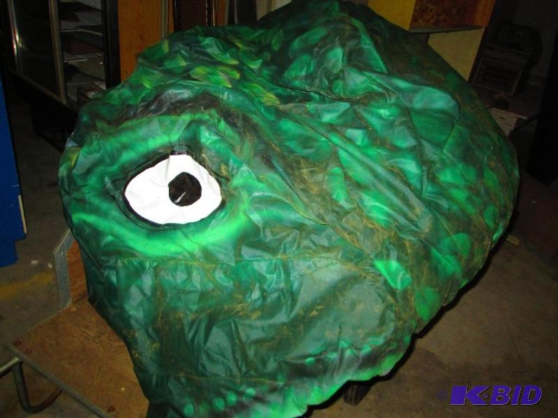 Blow up dinosaur, stands approximately 65 fee...