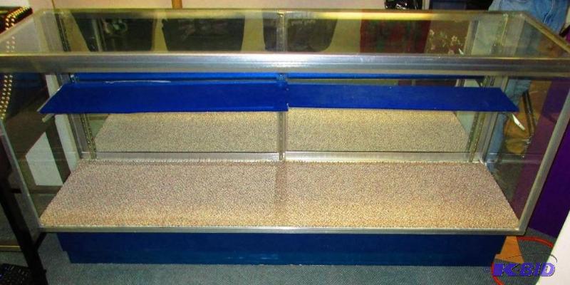 Glass display case, 20 inches deep, 72 inches...