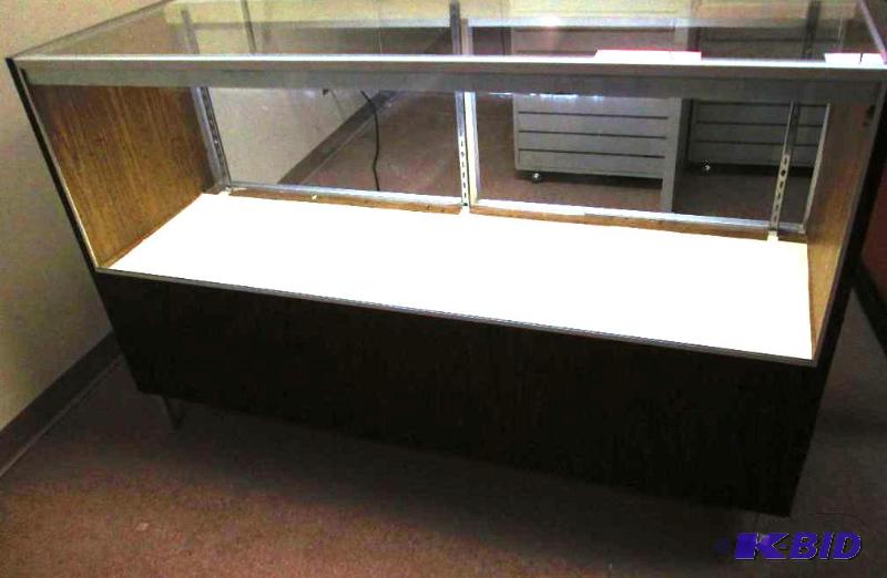 Glass display case, 20 inches deep, 60 inches...