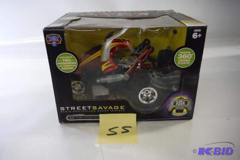 lot 55 image: Blue Hat Toy Company - Street Savage Remote-Controlled Stunt Car - 49 MHZ