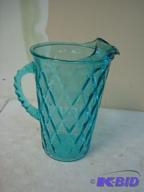 Blue Glass Water Pitcher...