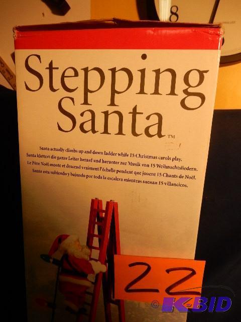 lot 22 image: Stepping Santa.. New in the box....