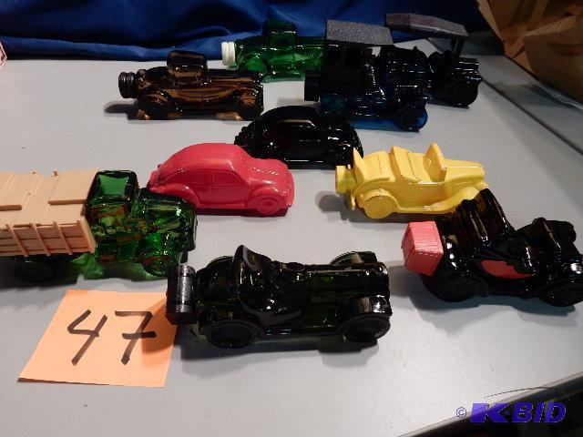 lot 47 image: Misc. Auto Themed AVON bottles.. Some have li...