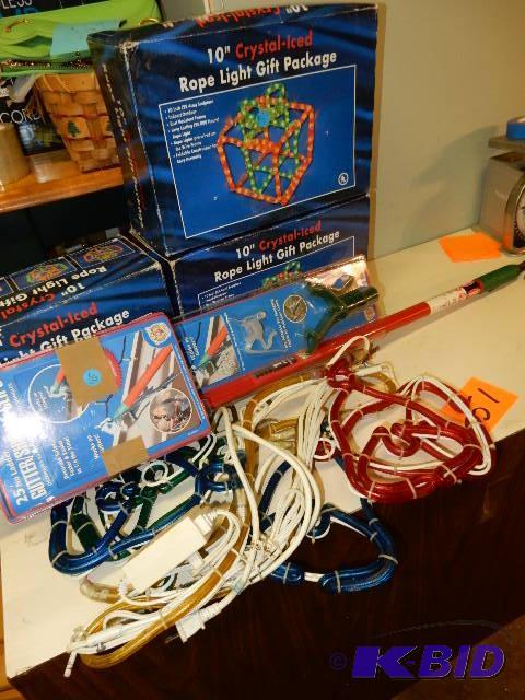 lot 51 image: Rope light decorations.. Gift packages, Set o...